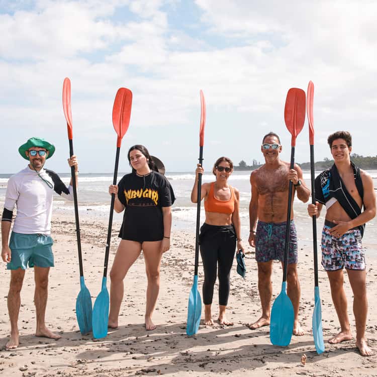 Group kayak paddling